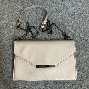 INC silver purse bought from Macy’s